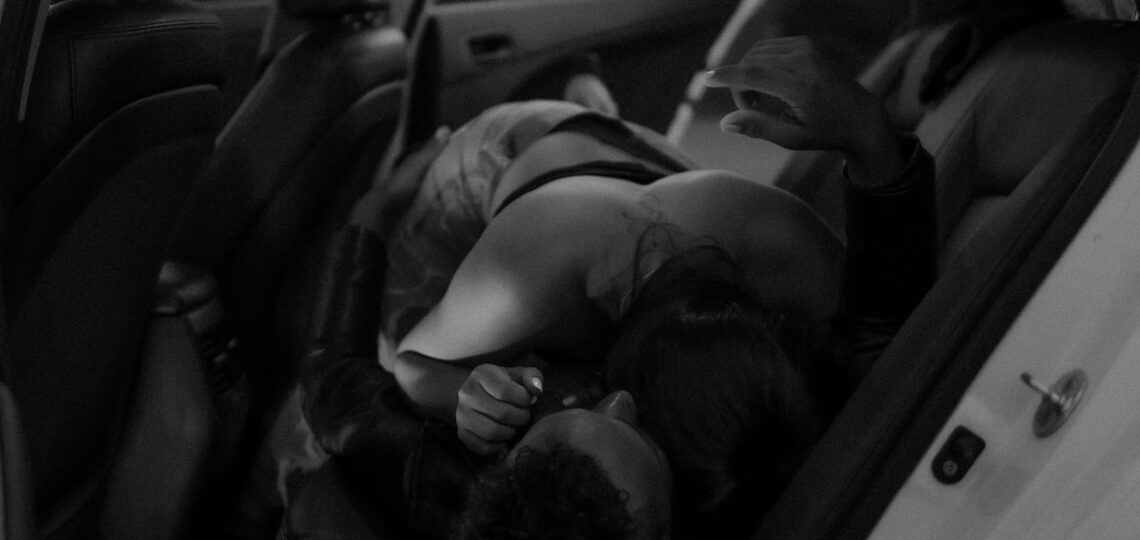 A Couple Erotic Moment Inside the Car's Backseat